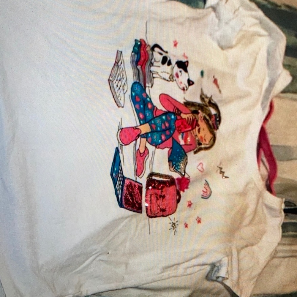 Featuring colorful graphic design style blouse